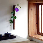 Flora walnut wood wall vase close-up texture