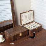 Lunaria Retro Black Walnut Jewelry Box holding earrings