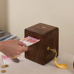 Minto walnut wood coin bank close-up