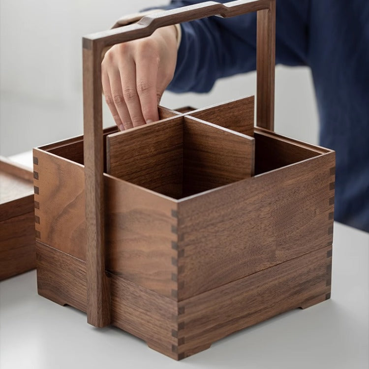 Portable walnut tea storage box placed in tea ceremony setup