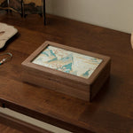 Solara Black Walnut Embroidered Jewelry Box holding earrings