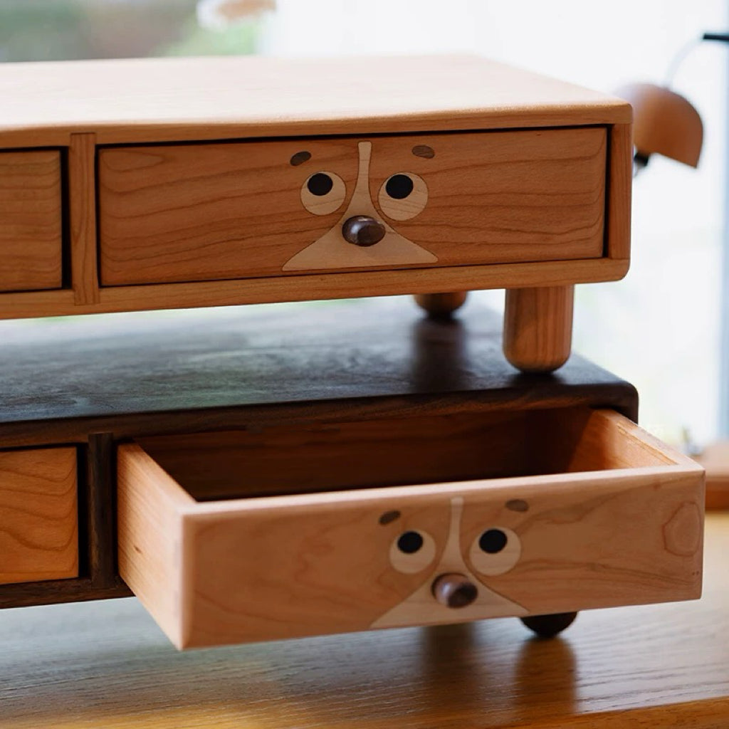 Solid Wood Monitor Stand by Pawpair holding computer monitor