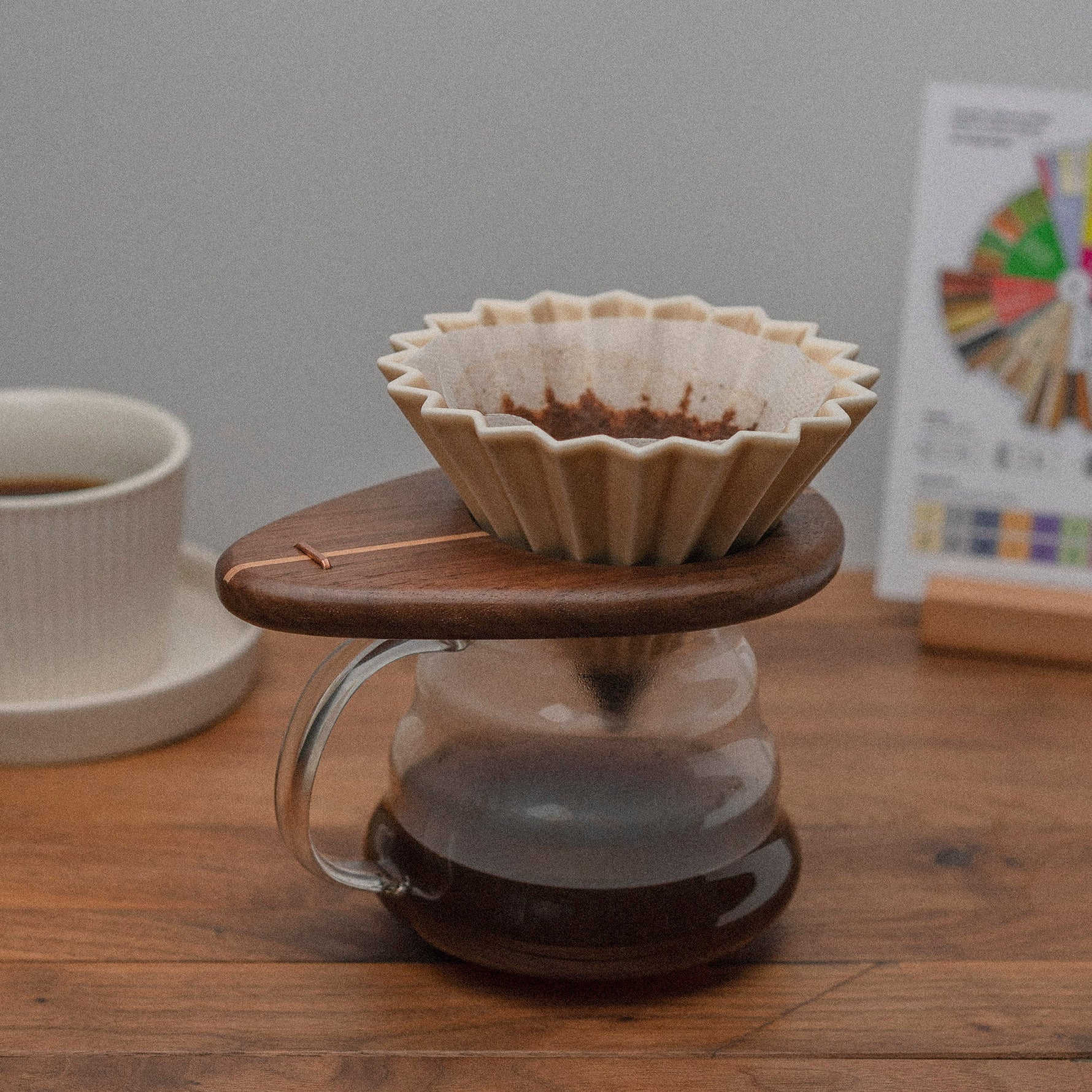 Wooden coffee stand holding V60 dripper and server